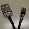 Warranty Void - Un cable mini-USB